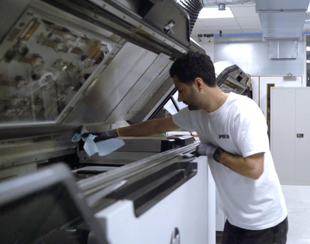 3dprintuk-technical staff maintaining high standards of MJF machine maintenance